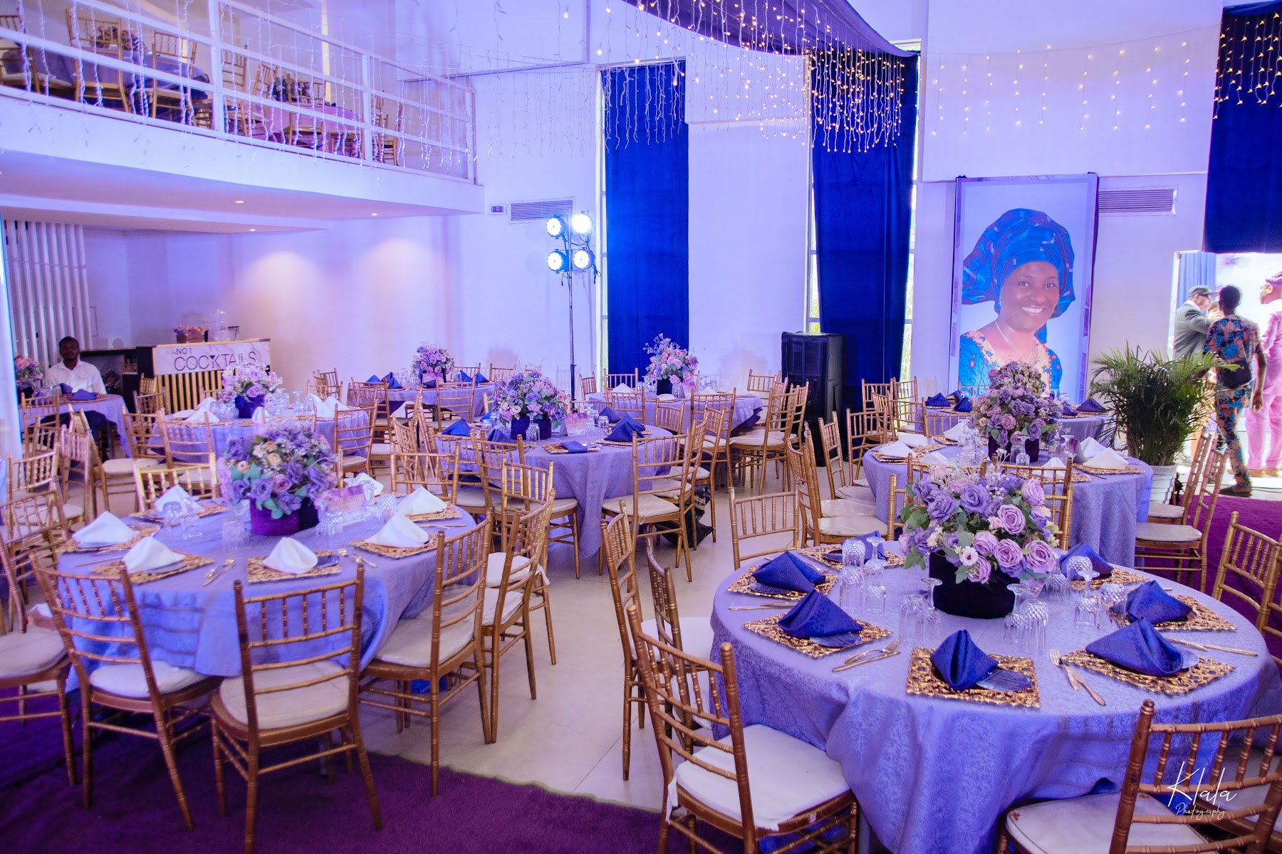 Birthday reception hall with floral table decor