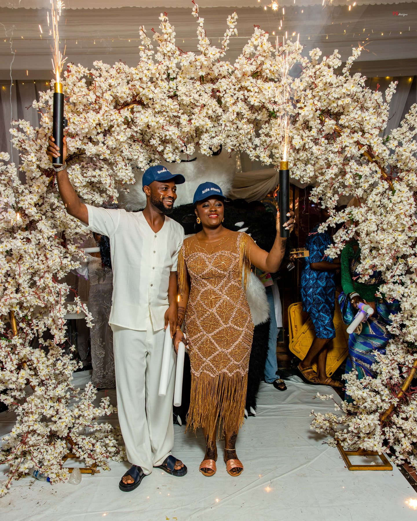 Couple entering After Party Service with sparklers