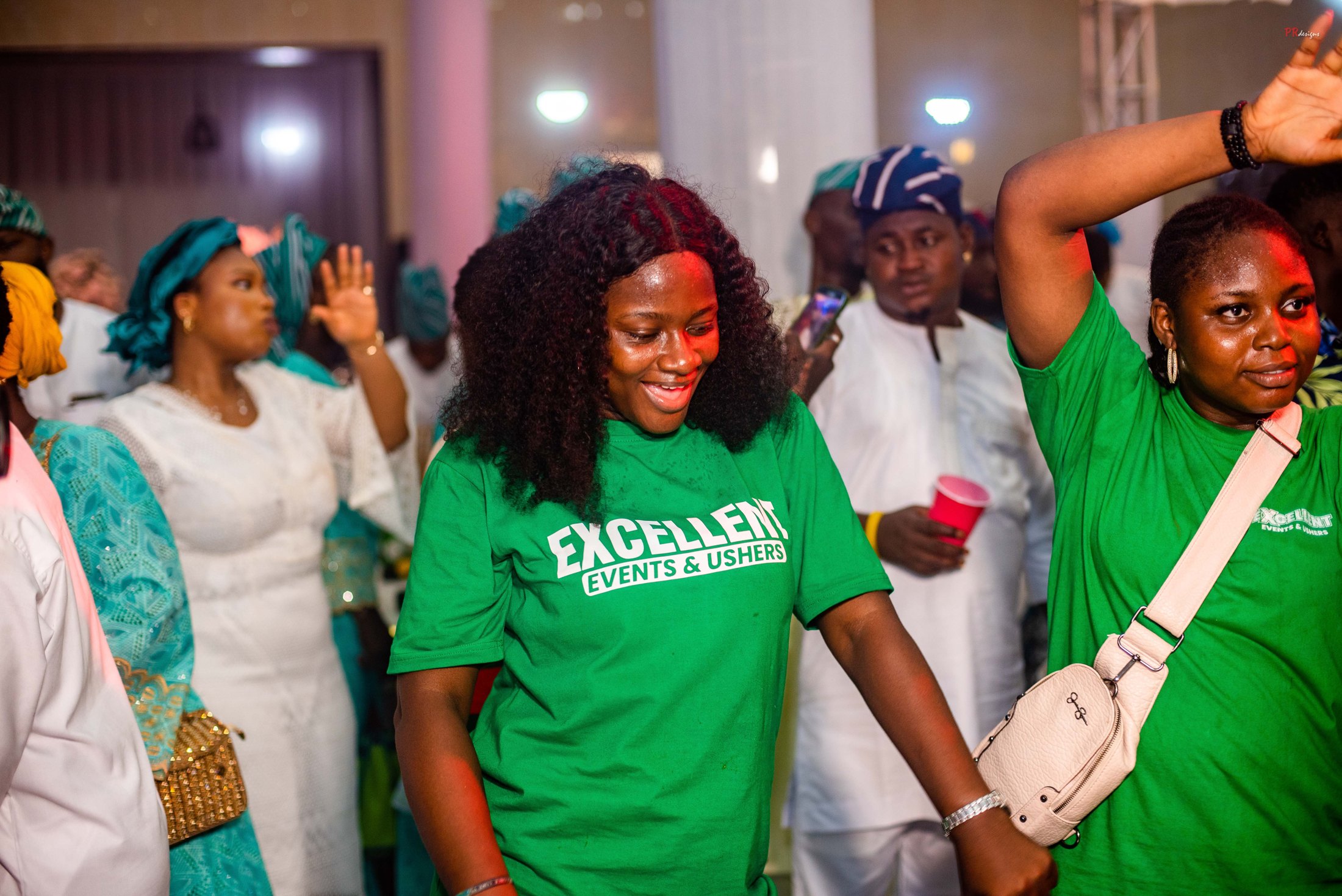 Excellent Events and Ushers team in branded shirts at an event