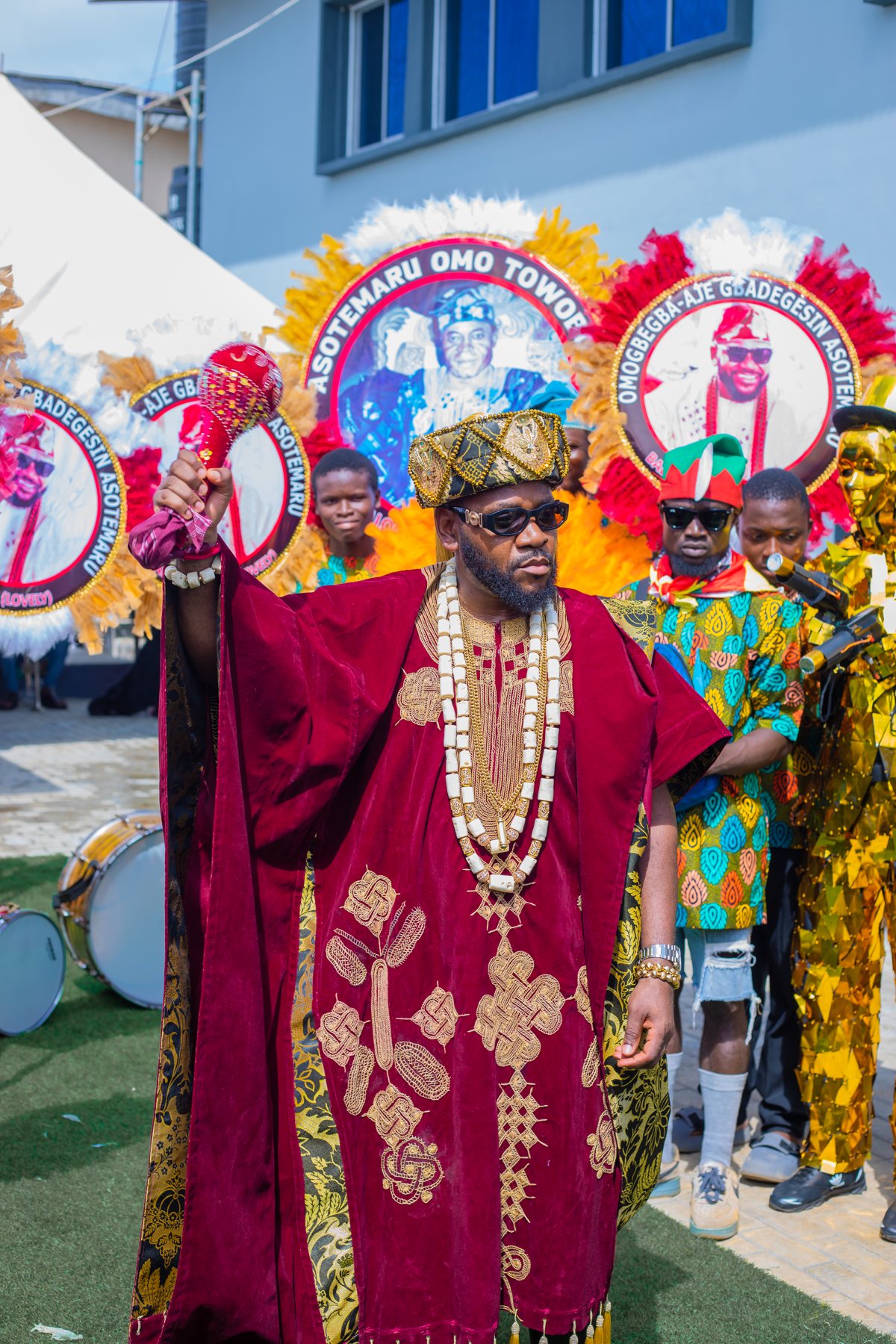 Cultural celebrant with traditional entourage
